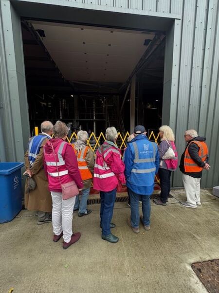 The tour then went to the storage sheds to view the wines already made