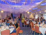 Gradually, guests started to sit at their tables