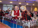 Checking which table was next to be awarded their prizes