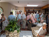 The queue for drinks was getting longer as more people arrived
