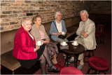 Eunice Clark, Brenda Arnold, Henny Castleton & Gerry Arnold enjoying a cup of coffee before the meeting starts