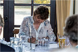 The Secretary taking the Minutes, hoping that she will be able to read her writing afterwards!