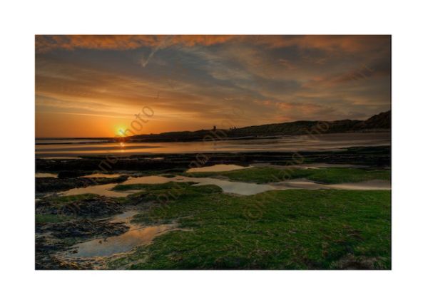 Sunrise over Dunstanburgh Castle