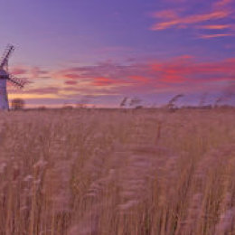 The Sun Goes Out over Thurne Dyke Windmill in the Norfolk Broads