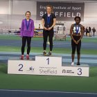 Lily receiving her gold medal