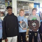 The Corp match trophies - Imogen, Denzel, Olivia (holding under 15 trophy), Ollie holding under 17 men trophy (Beth Goymour race to follow)