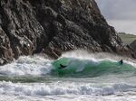 Surfing Kynance Cove