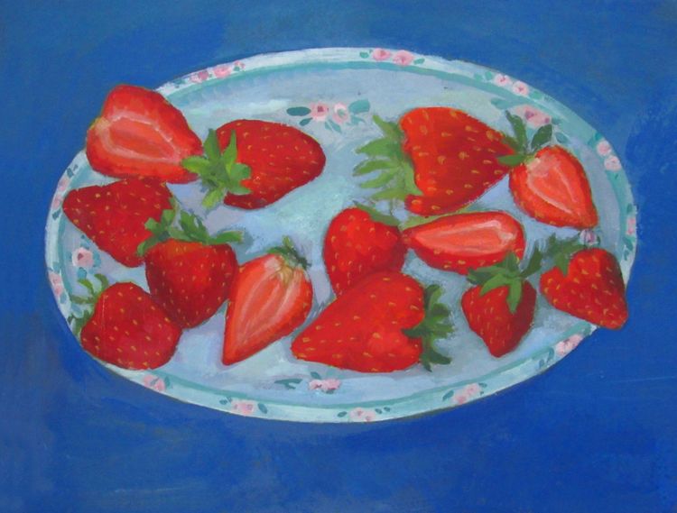Strawberries on a blue plate