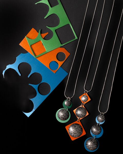 Pendants with Pebble Motifs