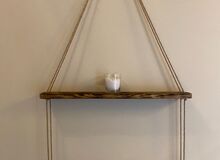 Scorched wood and hemp shelves