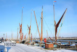 Sailing barges in the snow