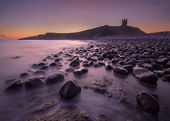 Dunstanburgh Castle at dawn