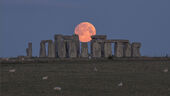 Full moon setting over Stonehenge