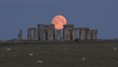 Full moon setting over Stonehenge