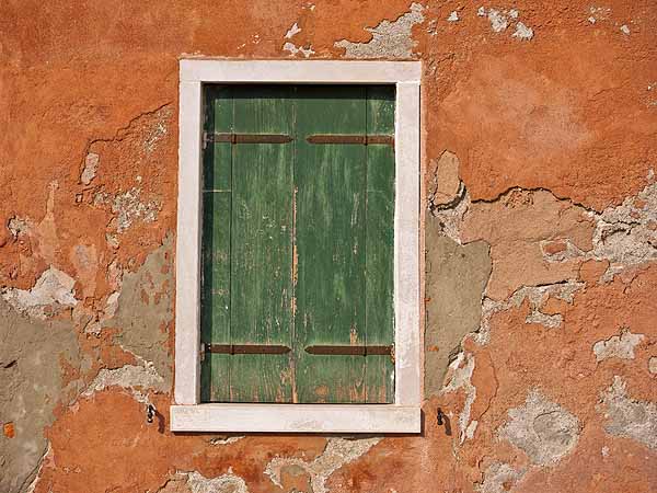 Green Shutters and Orange Wall