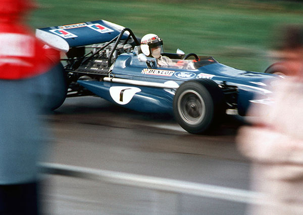 Jackie Stewart passes the Silverstone Pits in the Tyrell March
