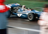 Jackie Stewart passes the Silverstone Pits in the Tyrell March