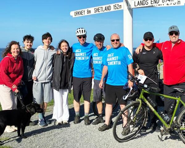 Ken and Family at John O'Groats