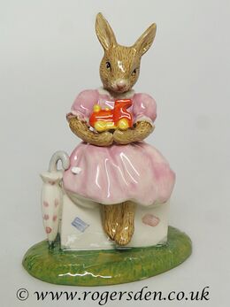 Sitting on a Suitcase Bunnykins  DB  482