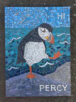 Garden puffin mosaic commission by Sue Kershaw, mosaic artist