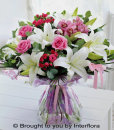 Lily, Rose & Cymbidium Orchid Hand-Tied: £75.00