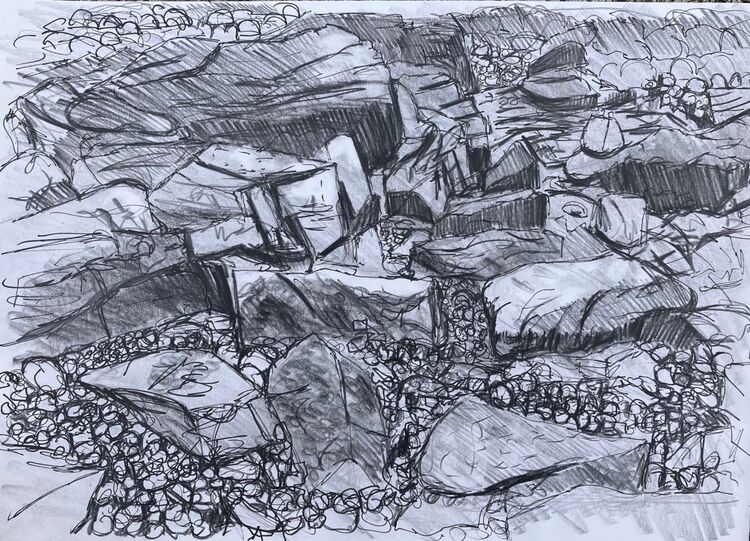 The spaces between pebbles.