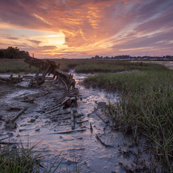 Skeletal remains of a fishing boat, at Bosham, West Sussex.