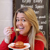 A young woman baker tastes one of her puddings Upton upon Severn business PR photography by Thousand Word Media Gloucestershire