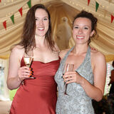 Two beautiful woment in evening dress enjoying a drinks reception, social photography by Thousand Word Media, Gloucestershire.