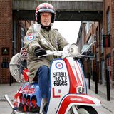 A scooter enthusiast on his Lambretta at Gloucester Quays editorial feature portrait photography by Thousand Word Media Gloucestershire.
