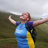 An Alzheimer's Society charity trekker celebrates event photography by Thousand Word Media Gloucestershire