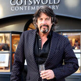 Designer Laurence Llewellyn-Bowen at an art gallery Cirencester portrait photography by Thousand Word Media Cheltenham