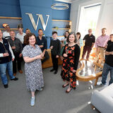 Staff celebrate the opening of their new office, Cheltenham, business PR photography by Thousand Word Media Gloucestershire
