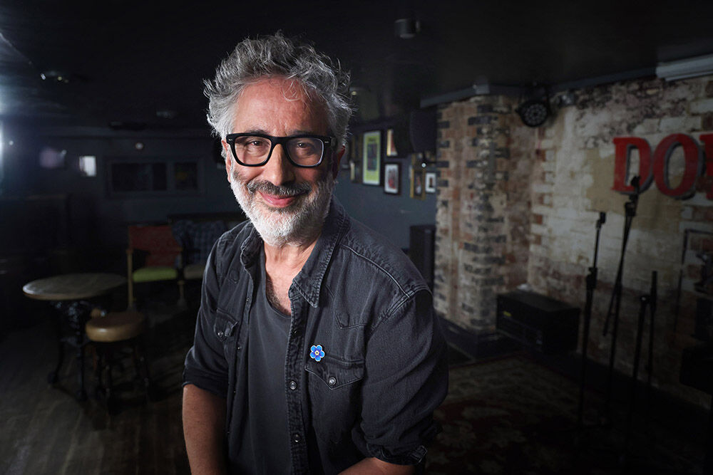 Portrait of David Baddiel, the comedian and writer, on filming location, London, editorial photography by Thousand Word Media