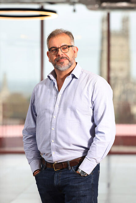 Open shirt, informal portrait of businessman, Thousand Word Media, Gloucester, South West