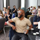 Smiling people at a company team building in progress, corporate photography by Thousand Word Media Gloucester