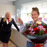 A new home owner celebrates with champagne and a bouquet corporate PR photography by Thousand Word Media Gloucestershire