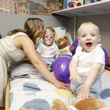 A mother and children in a WellChild Better At Home suite corporate photography by Thousand Word Media Gloucestershire