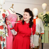 Young businesswoman in her vintage clothes shop Cheltenham editorial portrait photography by Thousand Word Media Gloucestershire.