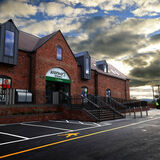 Warner's supermarkets new store exterior, under a beautiful evening sky, Upton upon Severn by Thousand Word Media Gloucestershire.