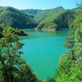 The placid azure waters of Lago di Vagli