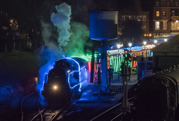 Steam and lights on the railway