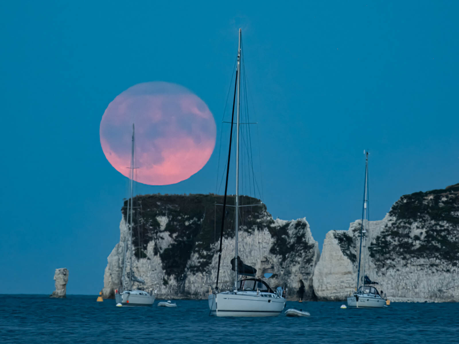 Sturgeon Moon rising at Old Harry Rocks