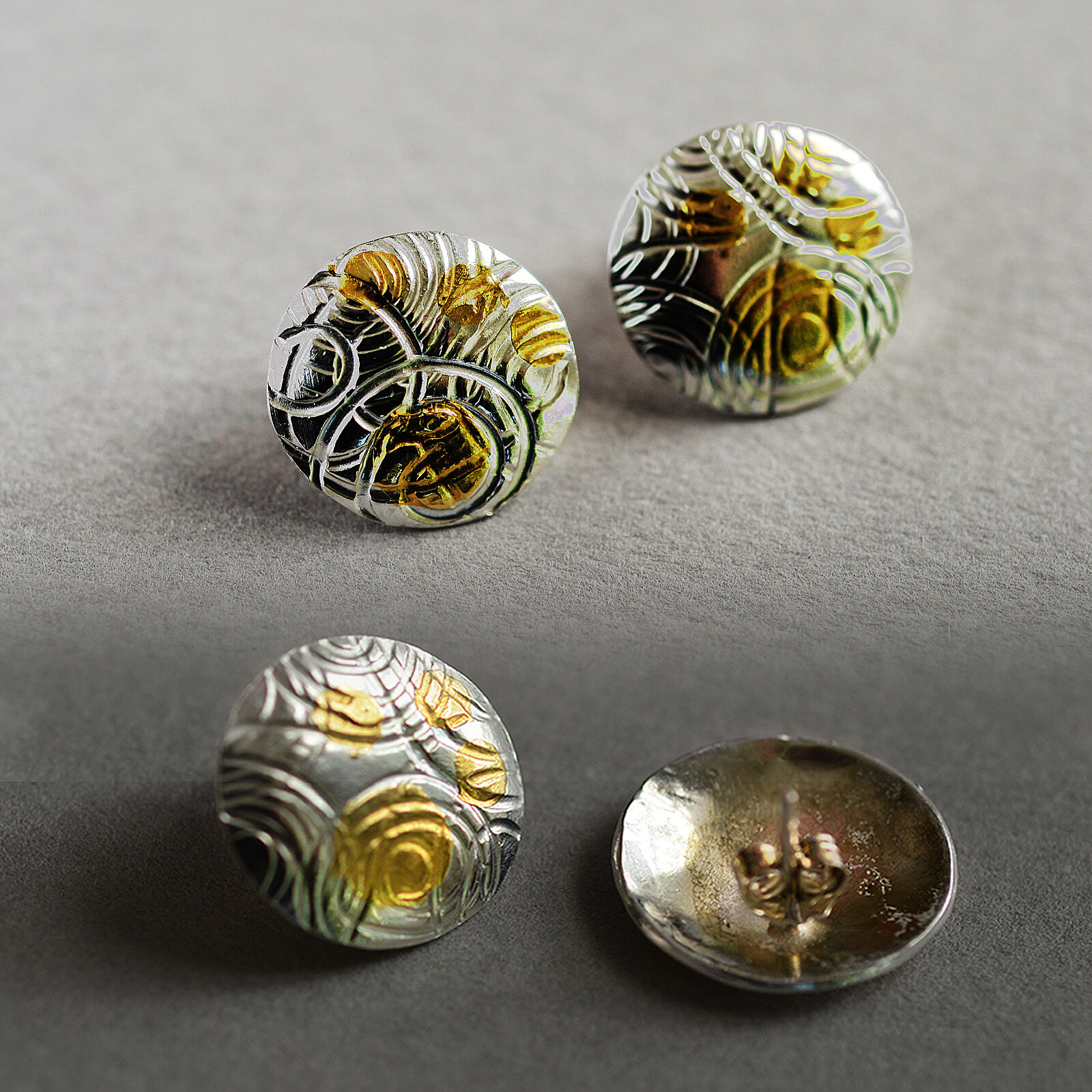 E20005 - Silver and gold domed and patterned earrngs