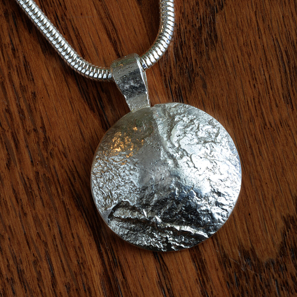 N18015 - Heavy domed silver pendant