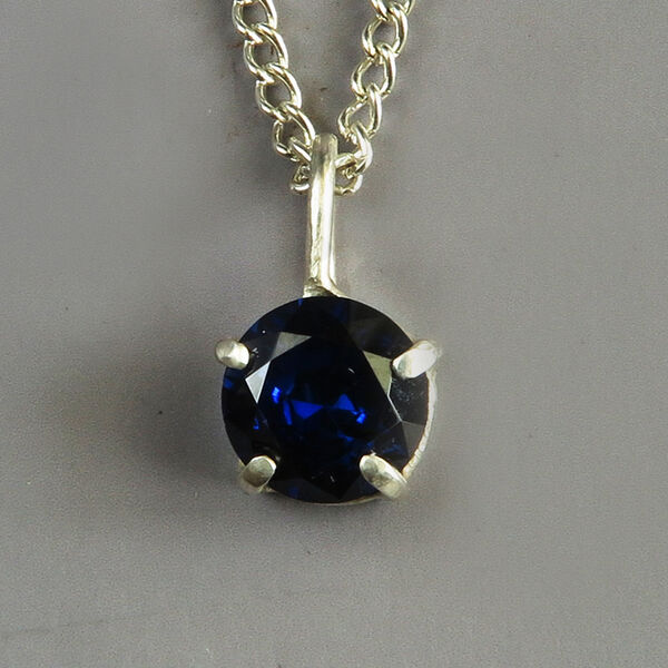 N18003 - Blue sapphire in hand-crafted sterling silver prong setting.