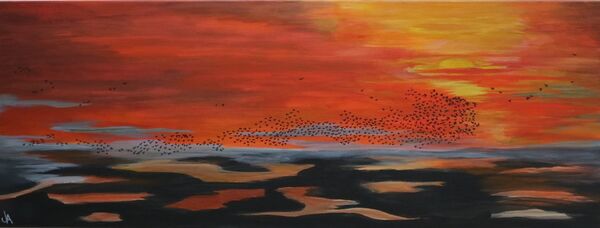 Starlings over Mudflats