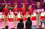 010 Team GB line up for Uneven Bars, L to R Whelan, Pinches, Tweddle & Tunney