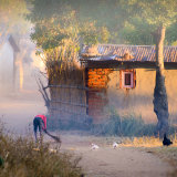 Sweeping the path, early morning, Mtunthama