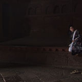 local woman in fine traditional dress